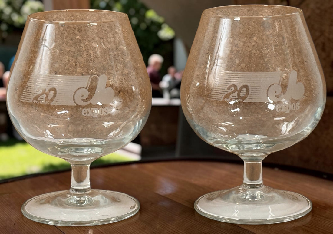 Vintage Montreal Expos 20th Anniversary snifter glasses, set of two made in France. Rare Quebec baseball memorabilia celebrating 20 years of Expos history.