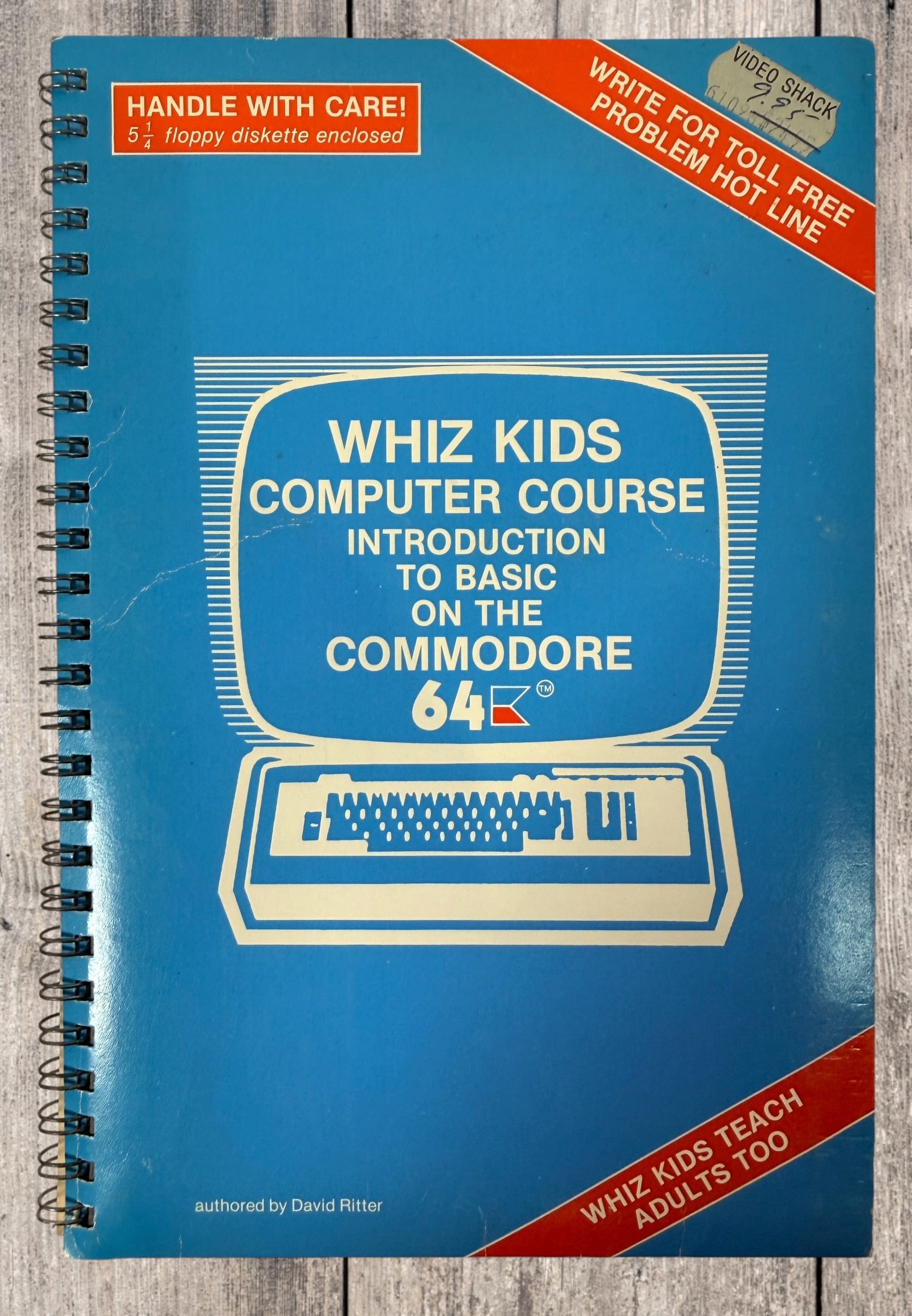 Original 1983 Whiz Kids Commodore 64 BASIC programming course manual with original 5¼-inch floppy disk. Rare Canadian retro computing collectible.