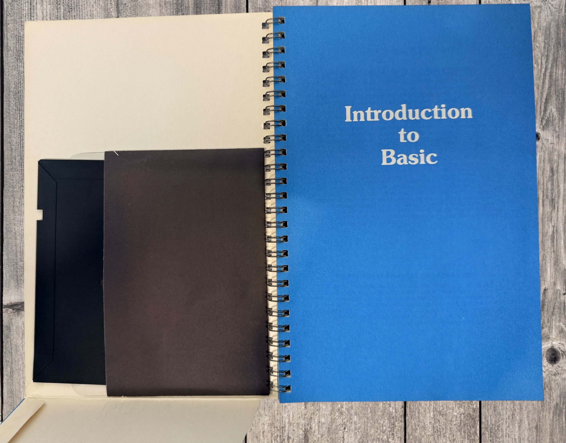 Original 1983 Whiz Kids Commodore 64 BASIC programming course manual with original 5¼-inch floppy disk. Rare Canadian retro computing collectible.