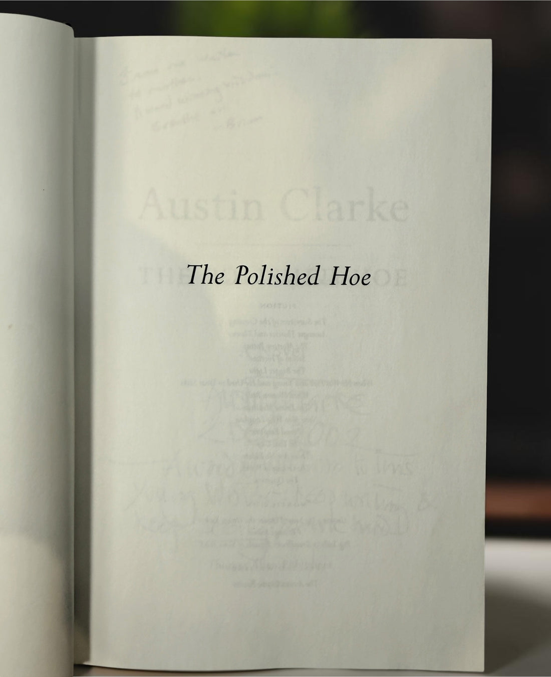 Signed Austin Clarke The Polished Hoe hardcover novel from 2002. Inscribed by the author and dated publication year. Collectible Canadian literary first-era edition.