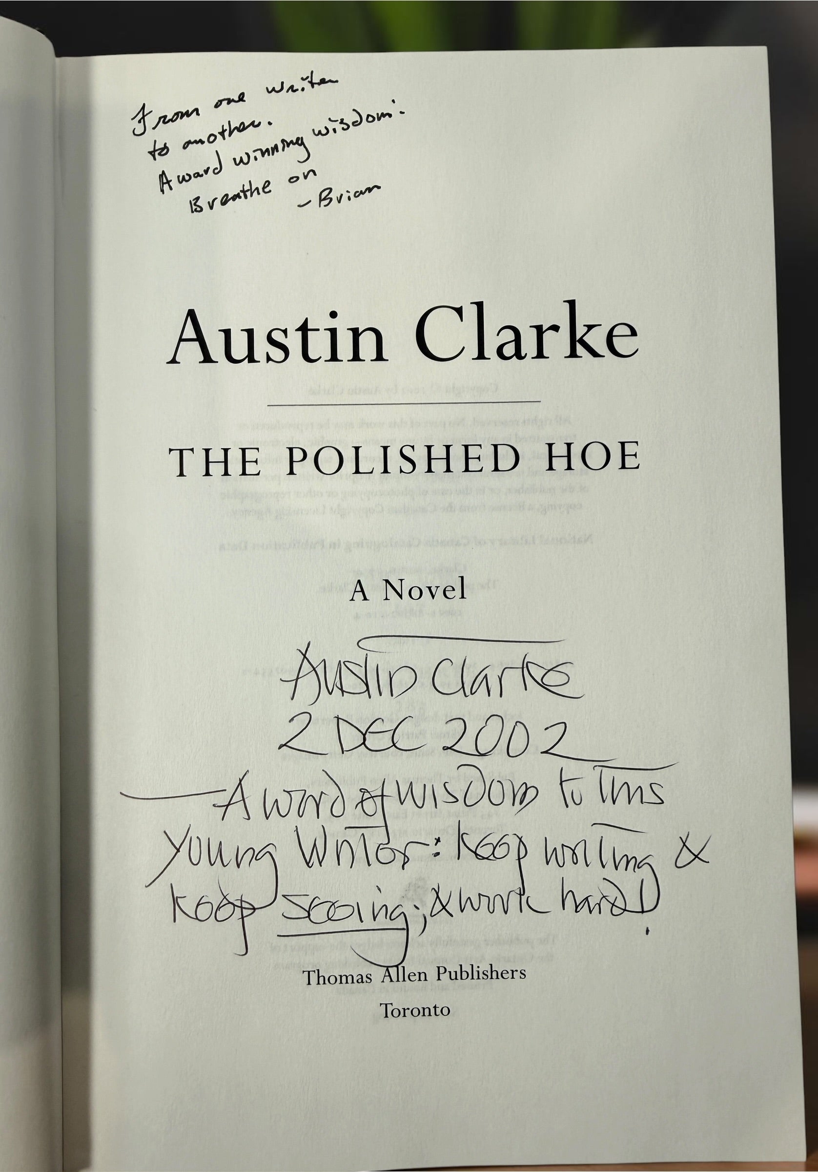 Signed Austin Clarke The Polished Hoe hardcover novel from 2002. Inscribed by the author and dated publication year. Collectible Canadian literary first-era edition.