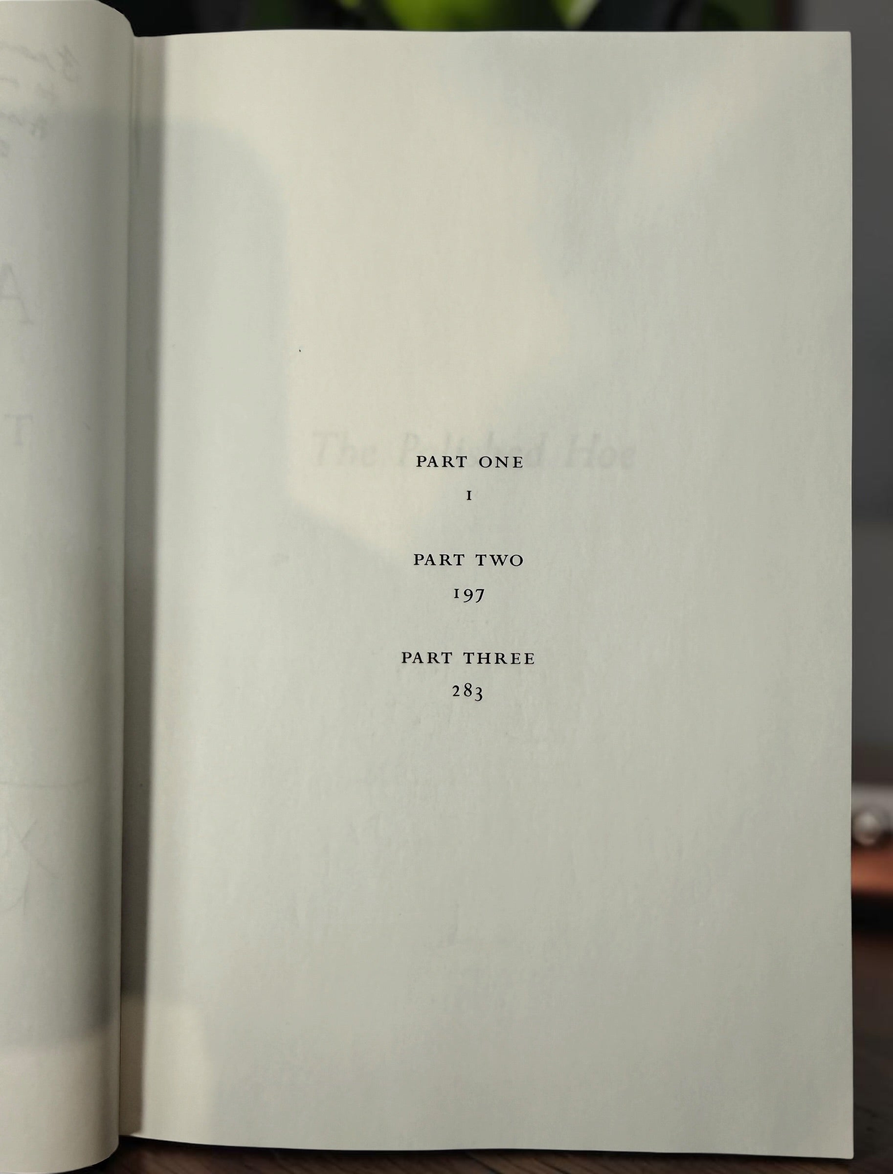 Signed Austin Clarke The Polished Hoe hardcover novel from 2002. Inscribed by the author and dated publication year. Collectible Canadian literary first-era edition.