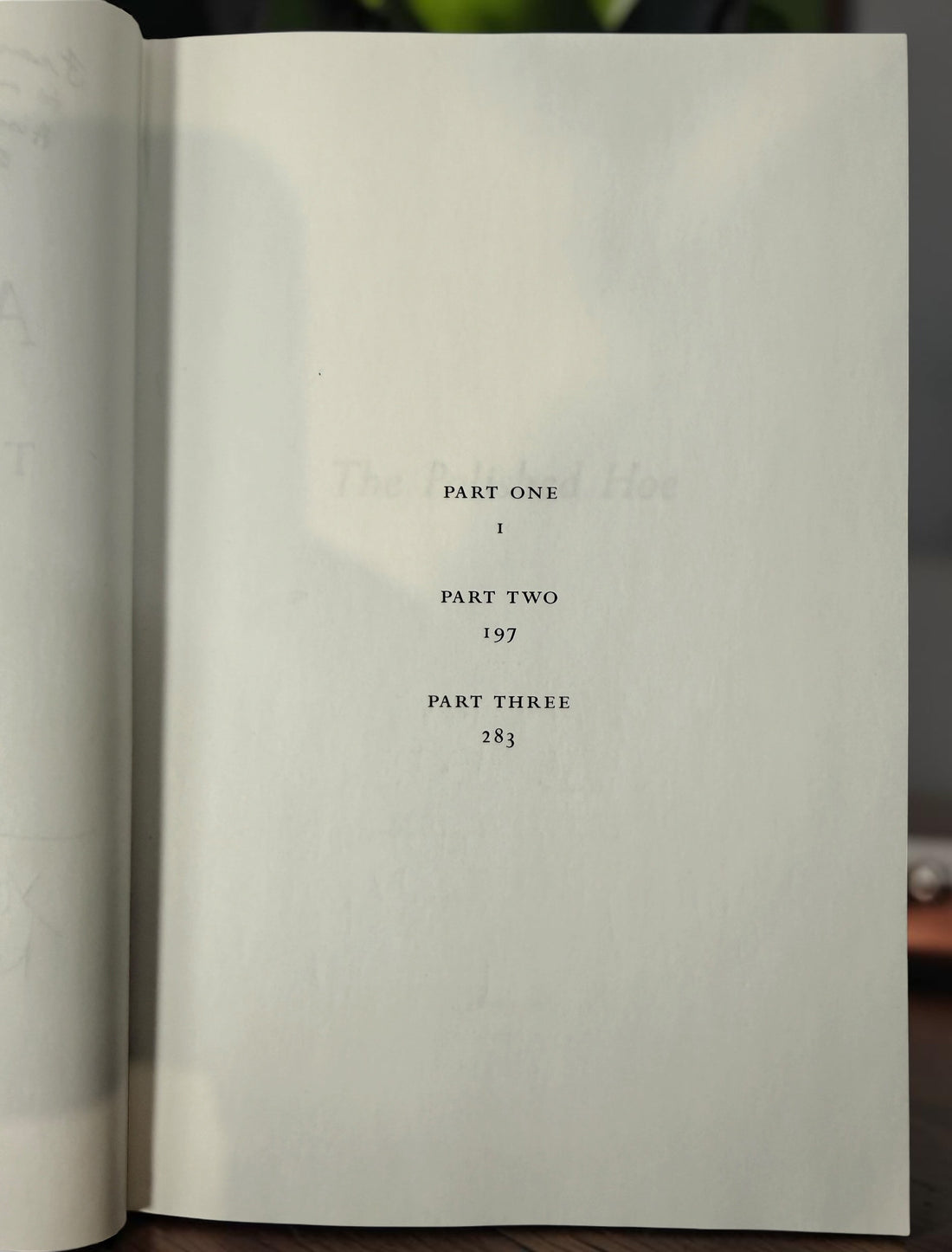 Signed Austin Clarke The Polished Hoe hardcover novel from 2002. Inscribed by the author and dated publication year. Collectible Canadian literary first-era edition.