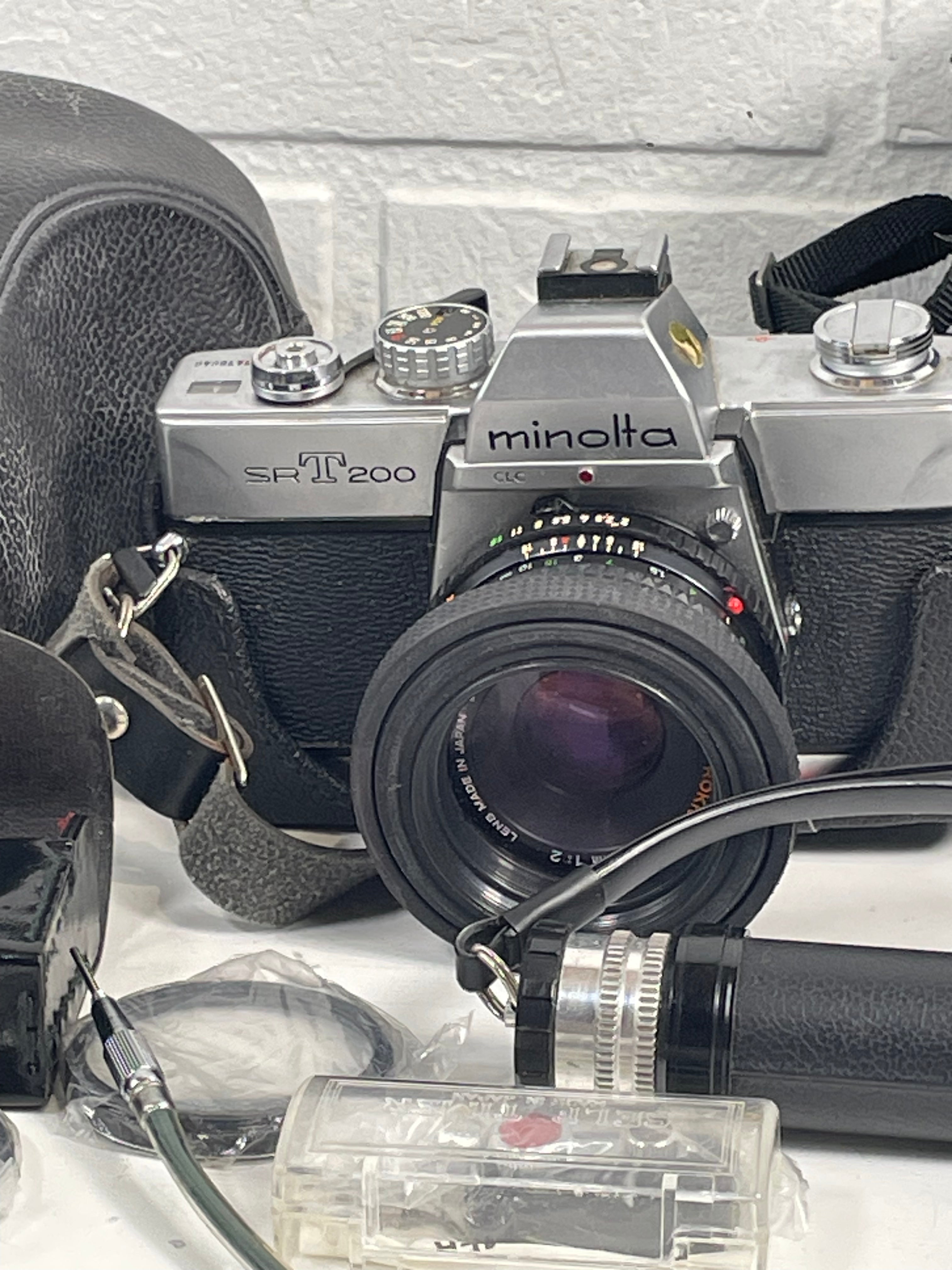 Minolta SR-T 200 Film Camera Kit – 2 Lenses (45mm & 135mm) + Flash, Filters, Grip, Shutter Cable