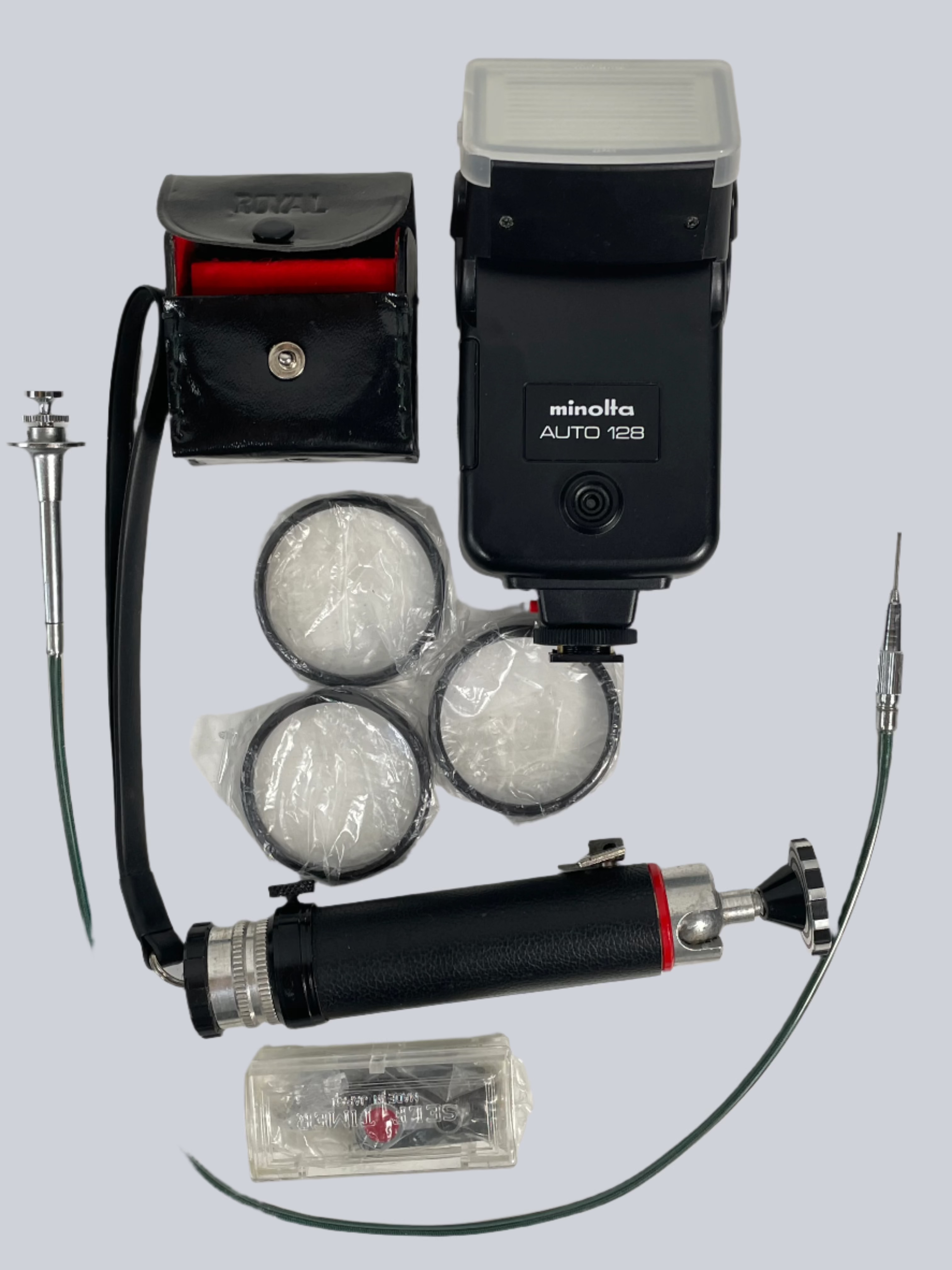 Minolta SR-T 200 Film Camera Kit – 2 Lenses (45mm & 135mm) + Flash, Filters, Grip, Shutter Cable