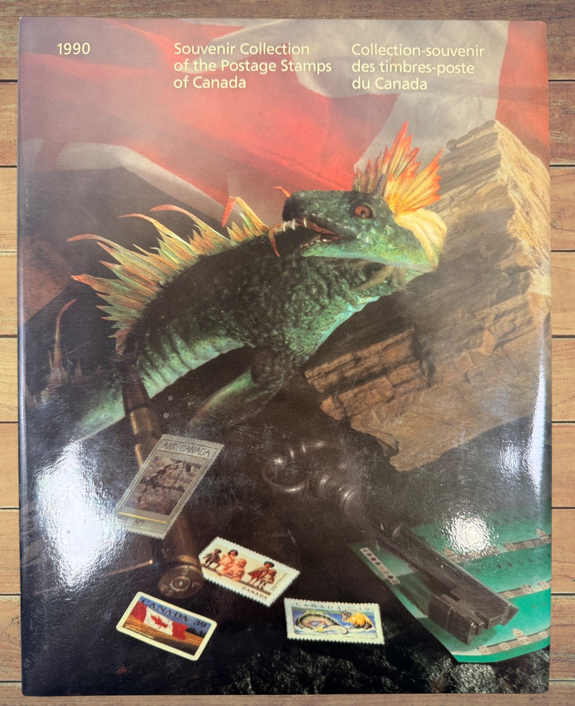 Complete Canada Post 1990 Souvenir Collection album featuring original Canadian stamps, bilingual content, historical notes, and philatelic reference material.