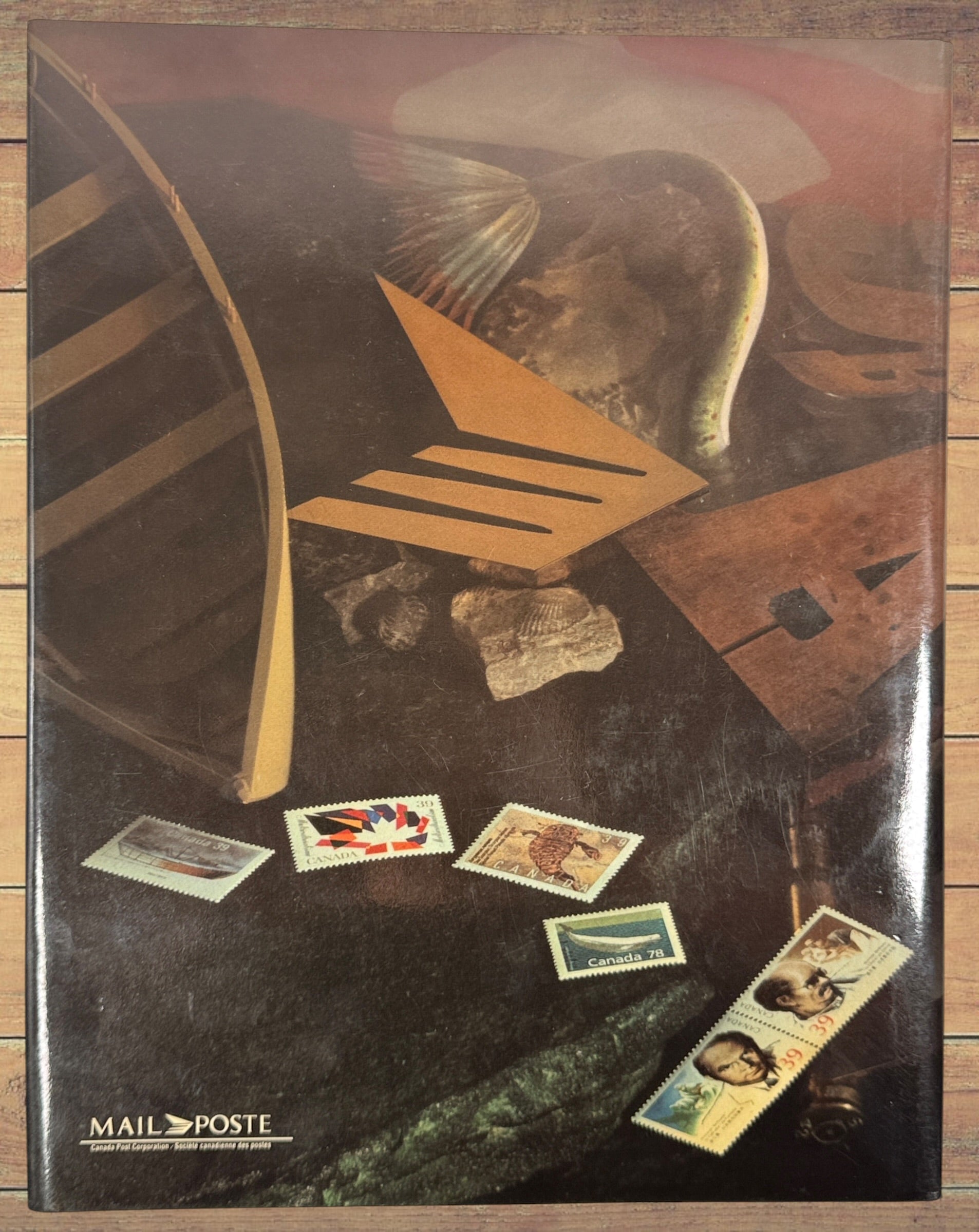 Complete Canada Post 1990 Souvenir Collection album featuring original Canadian stamps, bilingual content, historical notes, and philatelic reference material.