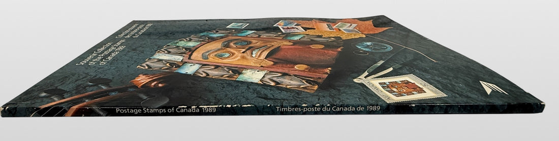 Official Canada Post 1989 stamp collection album featuring complete mounted Canadian postage stamps with bilingual descriptions and philatelic reference material.