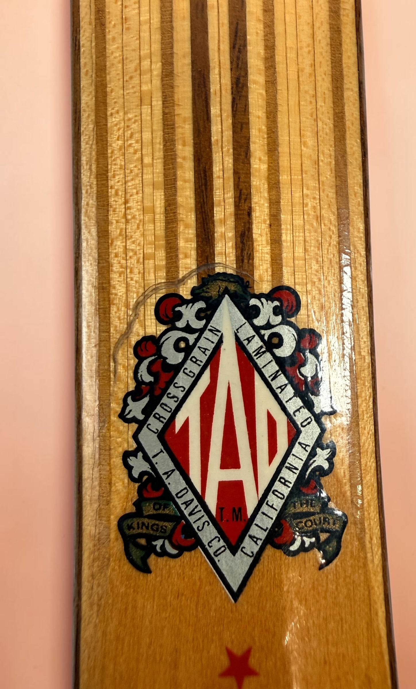 Vintage T.A. Davis Imperial wooden tennis racket made in the USA. Classic laminated hardwood racket with original grip and strings, ideal for collectors and décor.