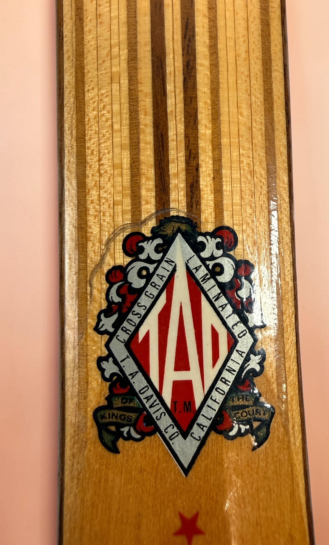 Vintage T.A. Davis Imperial wooden tennis racket made in the USA. Classic laminated hardwood racket with original grip and strings, ideal for collectors and décor.