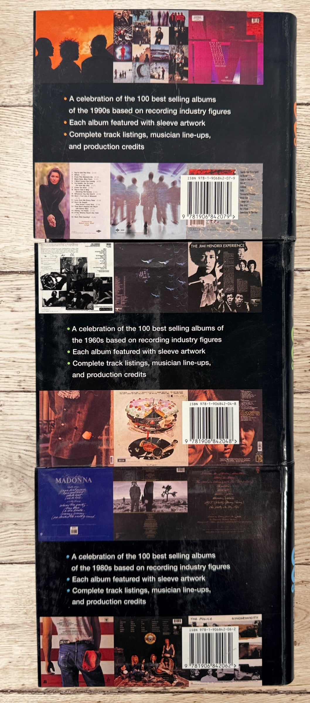 Complete 3-volume 100 Best Selling Albums book set covering the 1960s, 1980s and 1990s. Hardcover music reference books featuring iconic albums and artists.