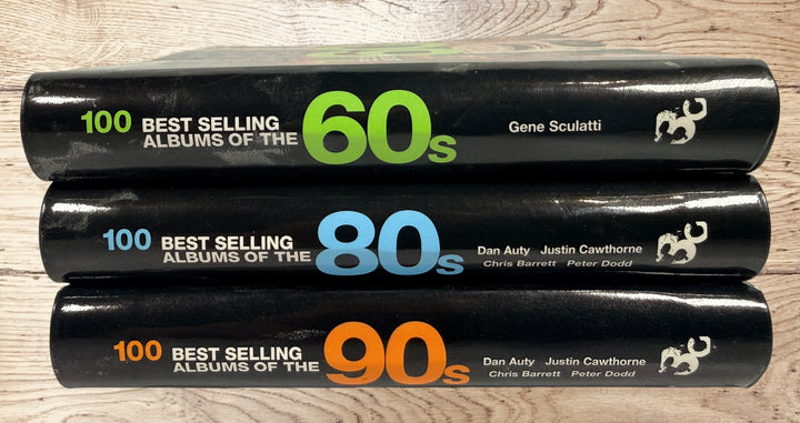 Complete 3-volume 100 Best Selling Albums book set covering the 1960s, 1980s and 1990s. Hardcover music reference books featuring iconic albums and artists.