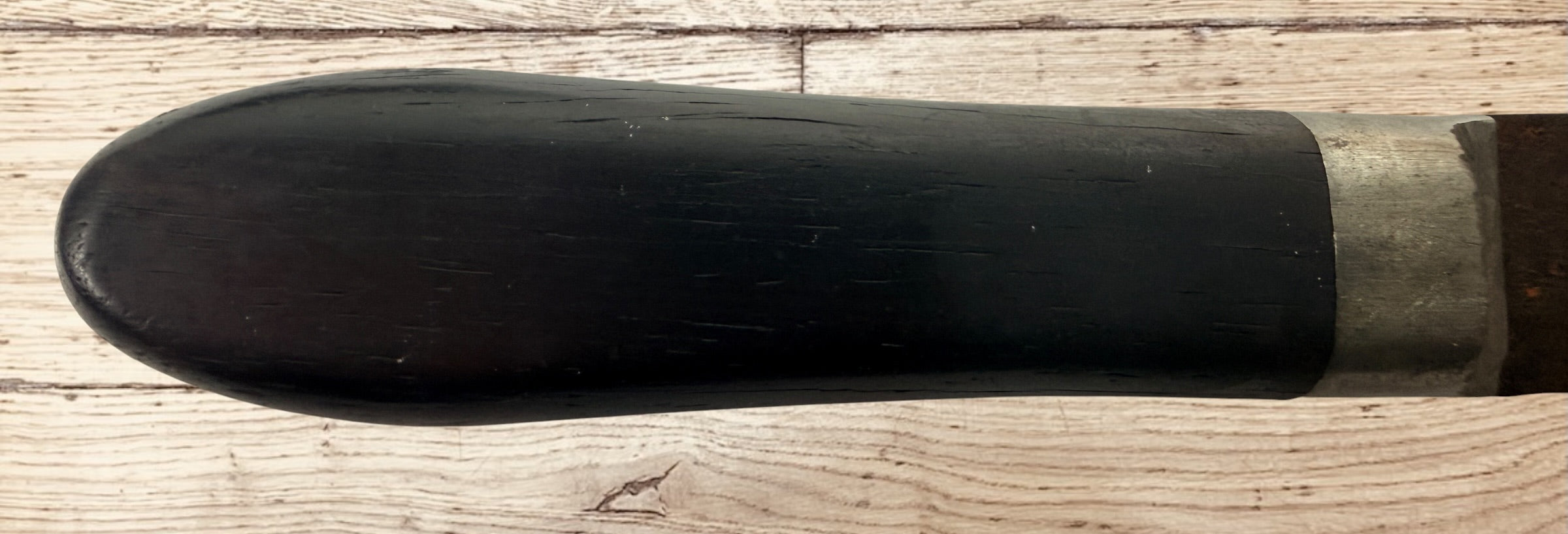 Antique buffalo skinner utility knife with carbon steel blade, hardwood handle, white-metal bolster, and original leather sheath. Classic hunting collectible.