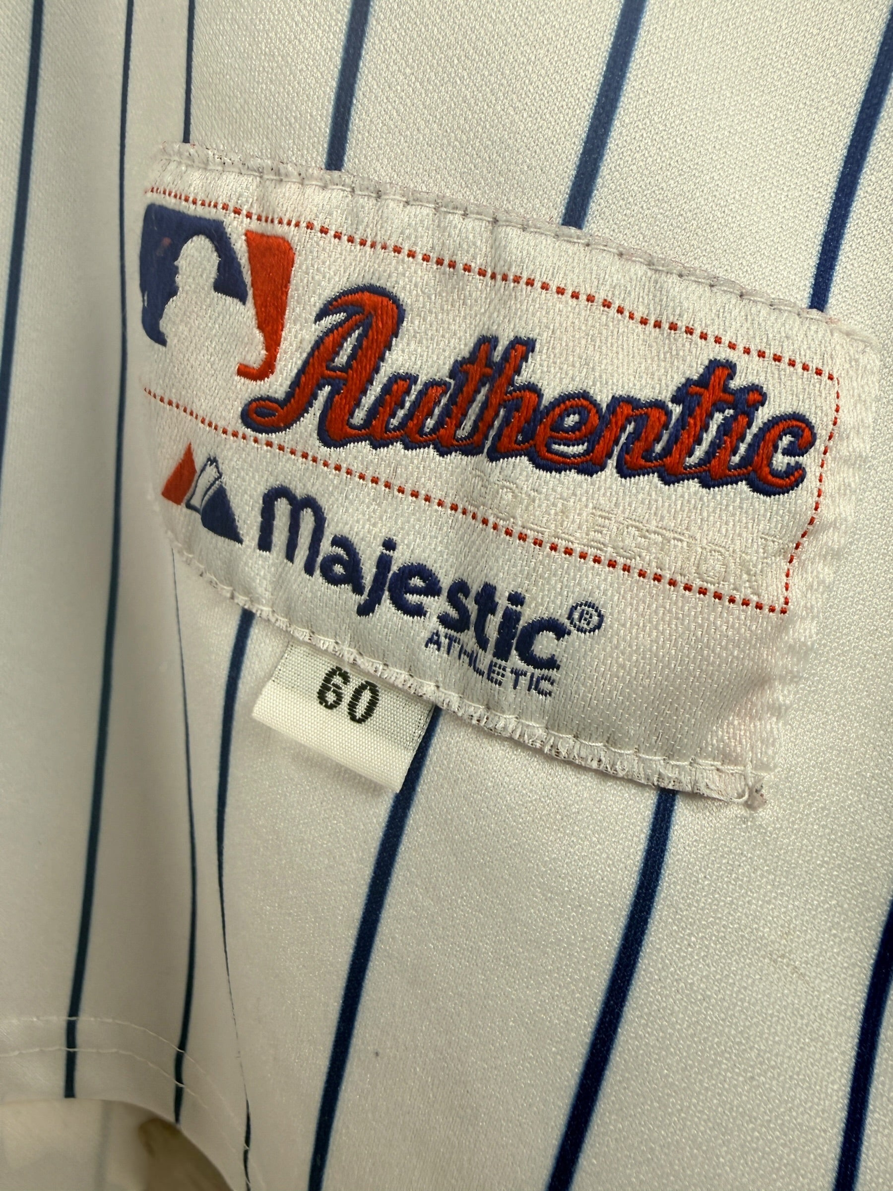 Authentic Majestic New York Mets Pedro Martinez #45 jersey in size XXL. Official MLB licensed pinstripe jersey with sewn graphics and Mets sleeve patch.