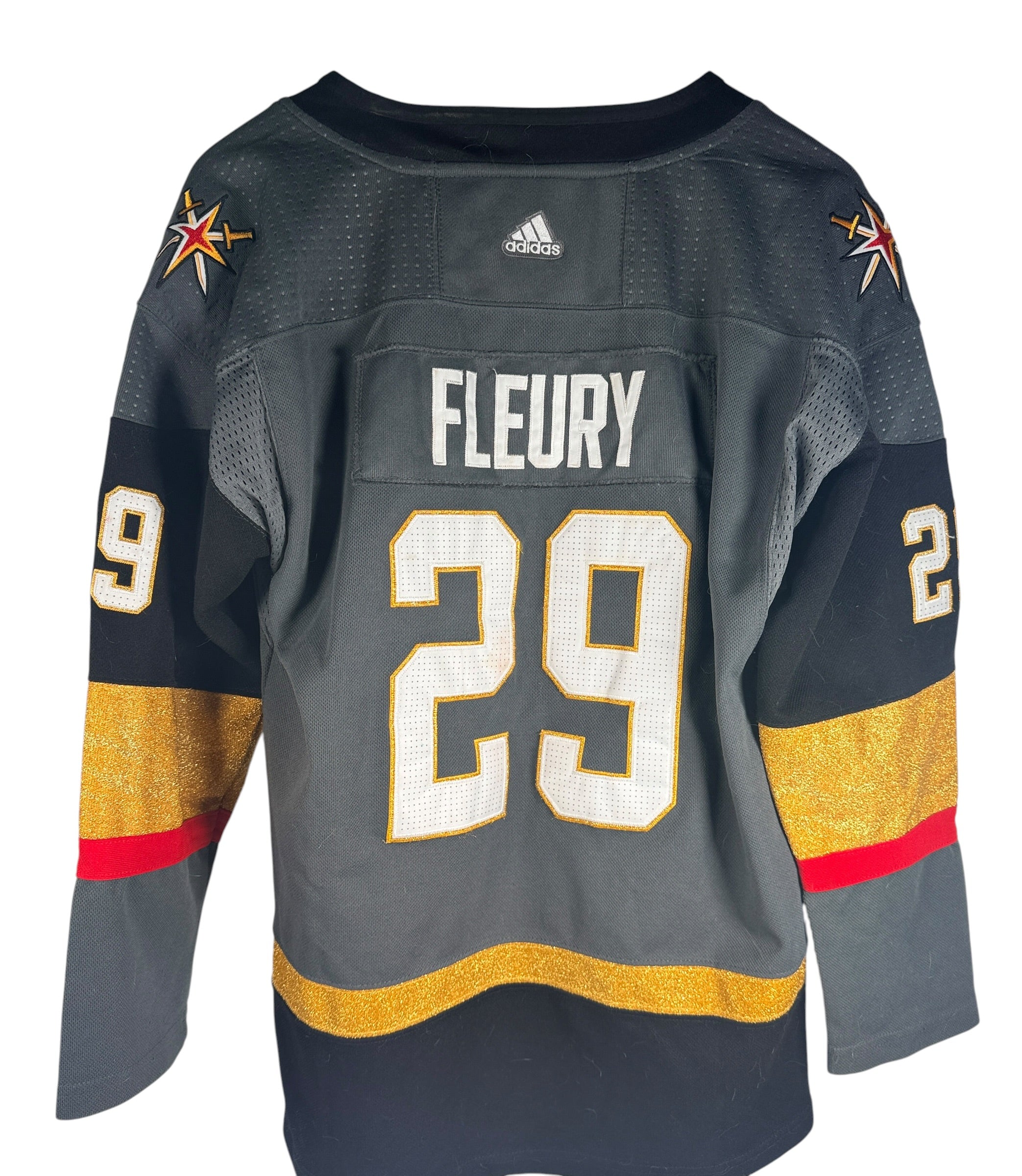 Adidas Vegas Golden Knights Marc-André Fleury #29 hockey jersey size Large. Official NHL Climalite jersey with sewn graphics and shoulder patches.