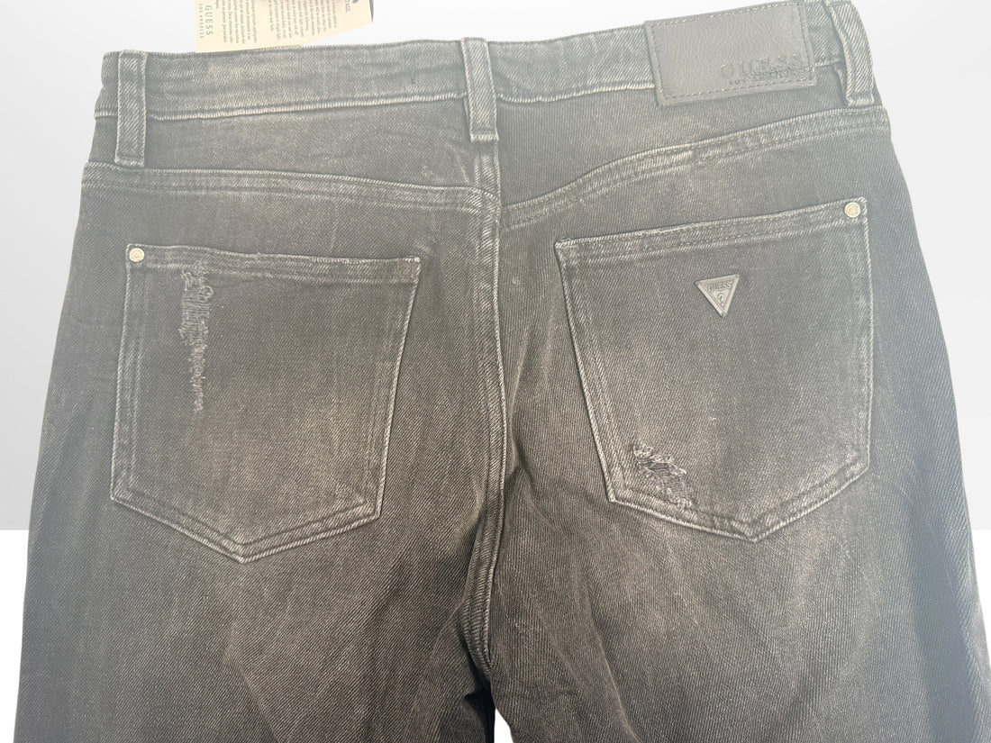 NWT GUESS The It Girl Skinny jeans in Glitter Punk wash. Black distressed stretch denim with shimmer finish, lace-up ankle details, and original tags, size 29.