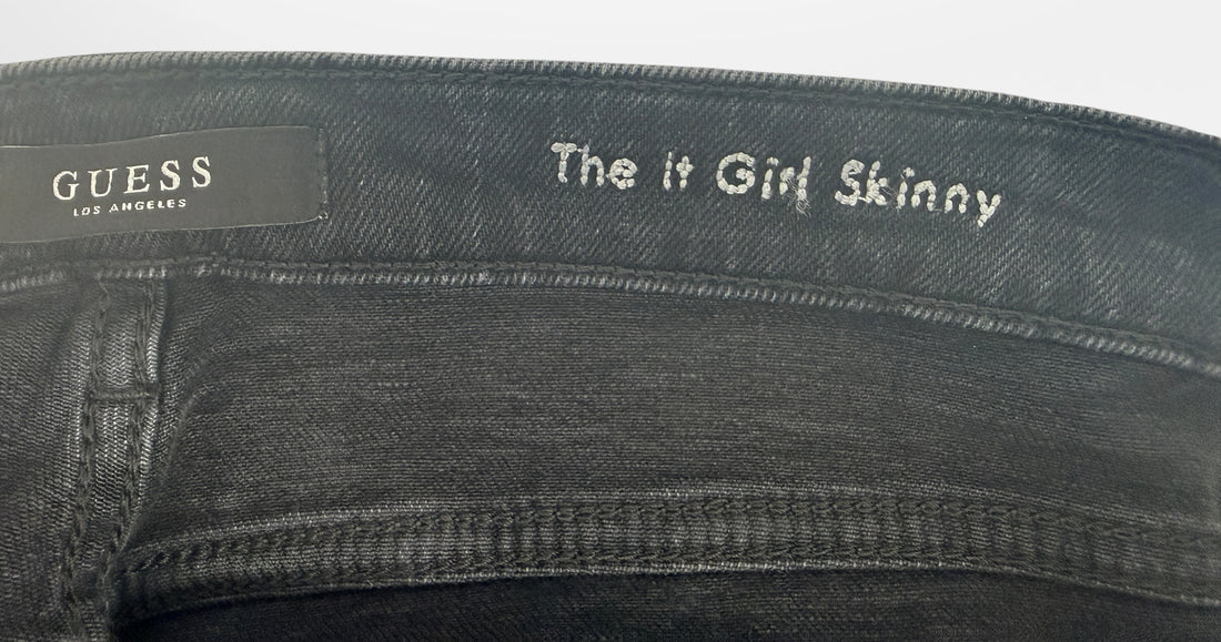 NWT GUESS The It Girl Skinny jeans in Glitter Punk wash. Black distressed stretch denim with shimmer finish, lace-up ankle details, and original tags, size 29.