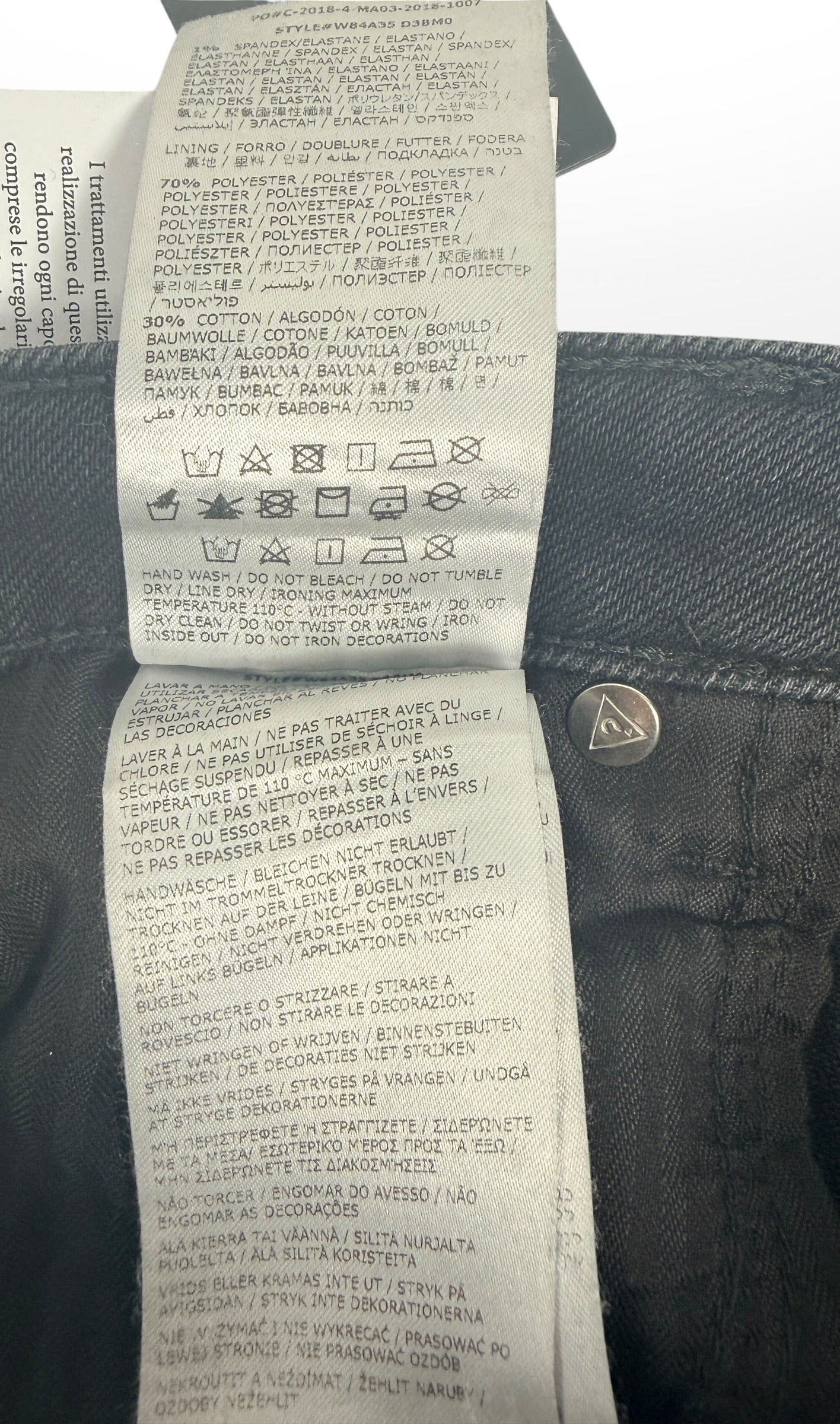 NWT GUESS The It Girl Skinny jeans in Glitter Punk wash. Black distressed stretch denim with shimmer finish, lace-up ankle details, and original tags, size 29.