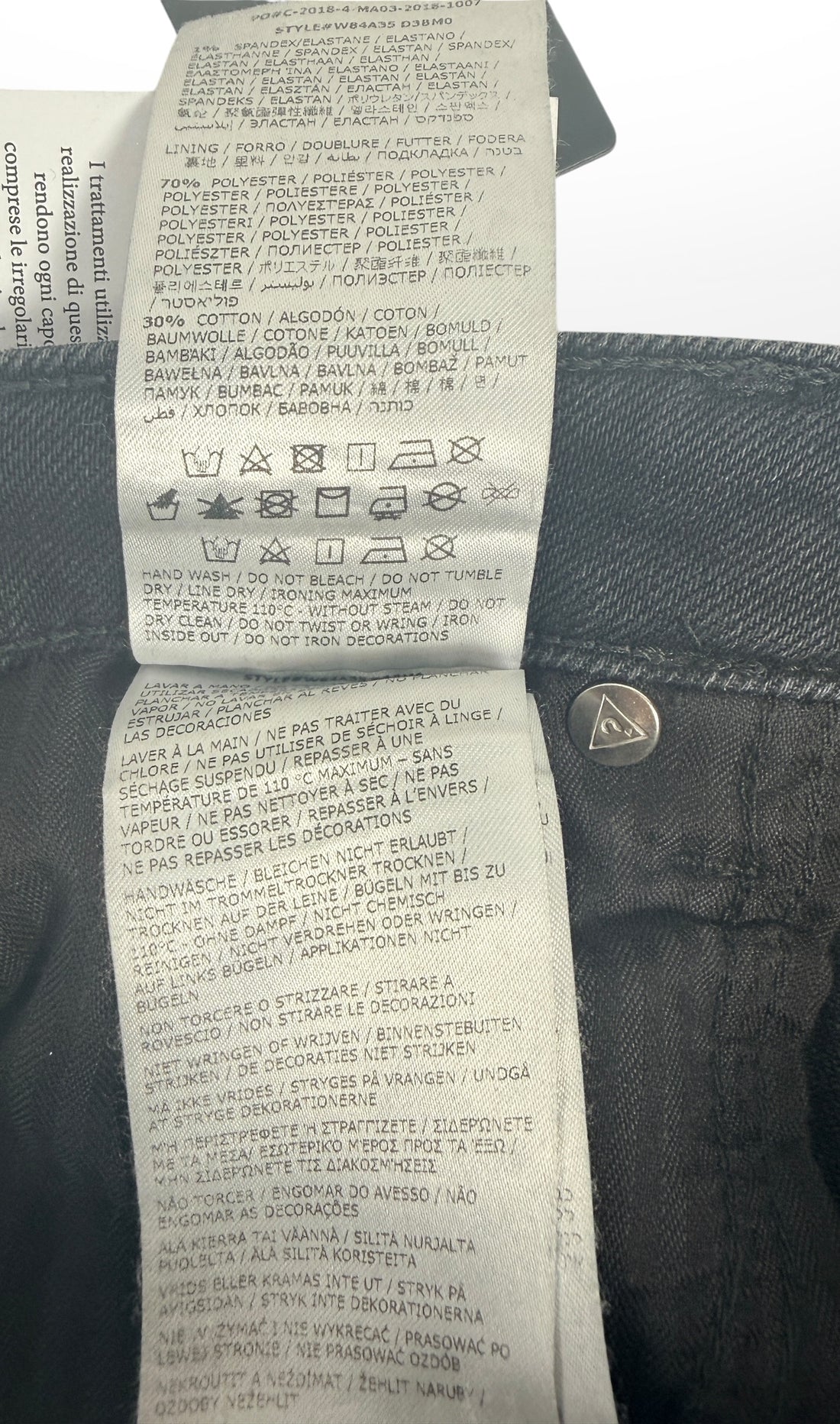 NWT GUESS The It Girl Skinny jeans in Glitter Punk wash. Black distressed stretch denim with shimmer finish, lace-up ankle details, and original tags, size 29.