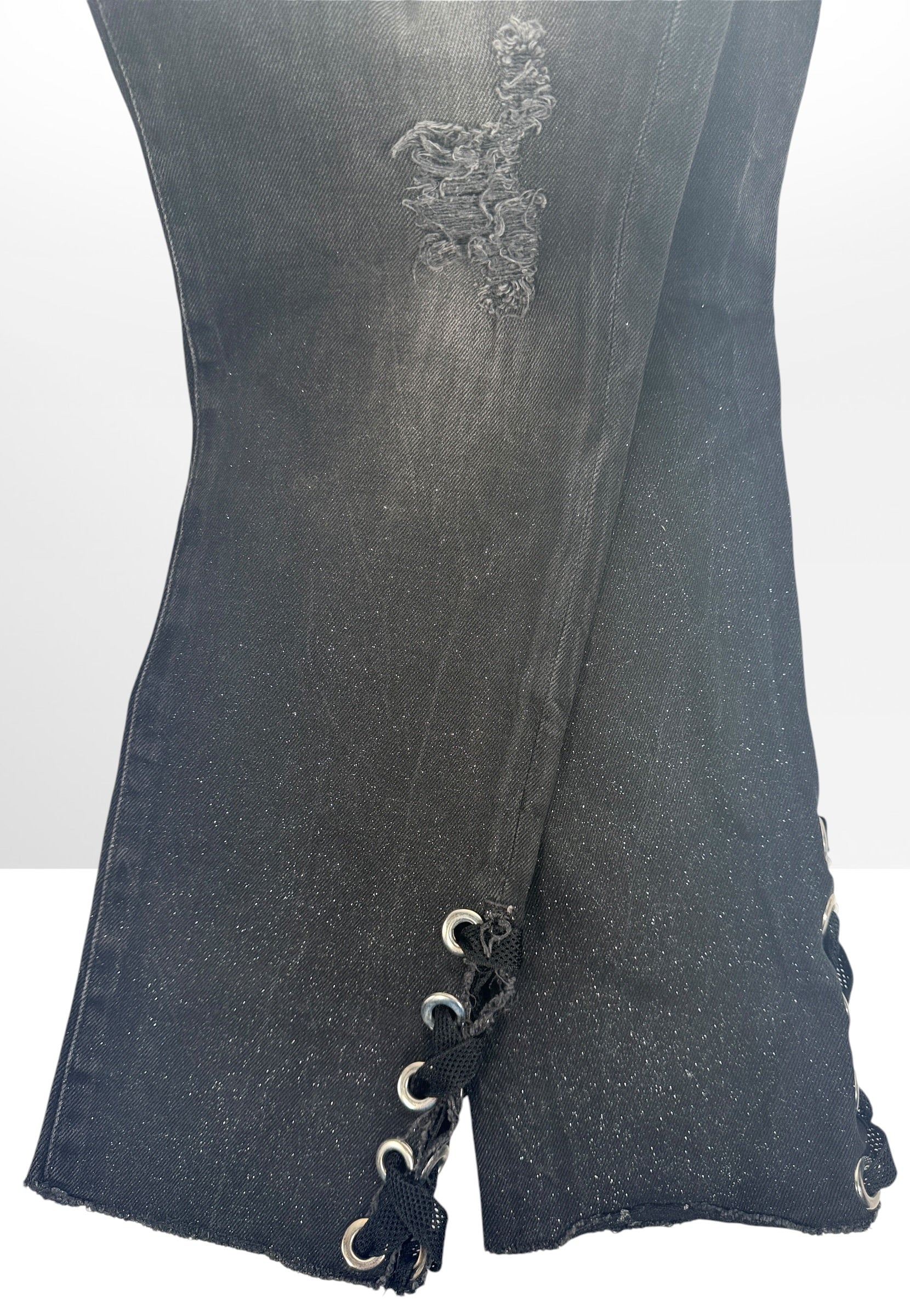 NWT GUESS The It Girl Skinny jeans in Glitter Punk wash. Black distressed stretch denim with shimmer finish, lace-up ankle details, and original tags, size 29.