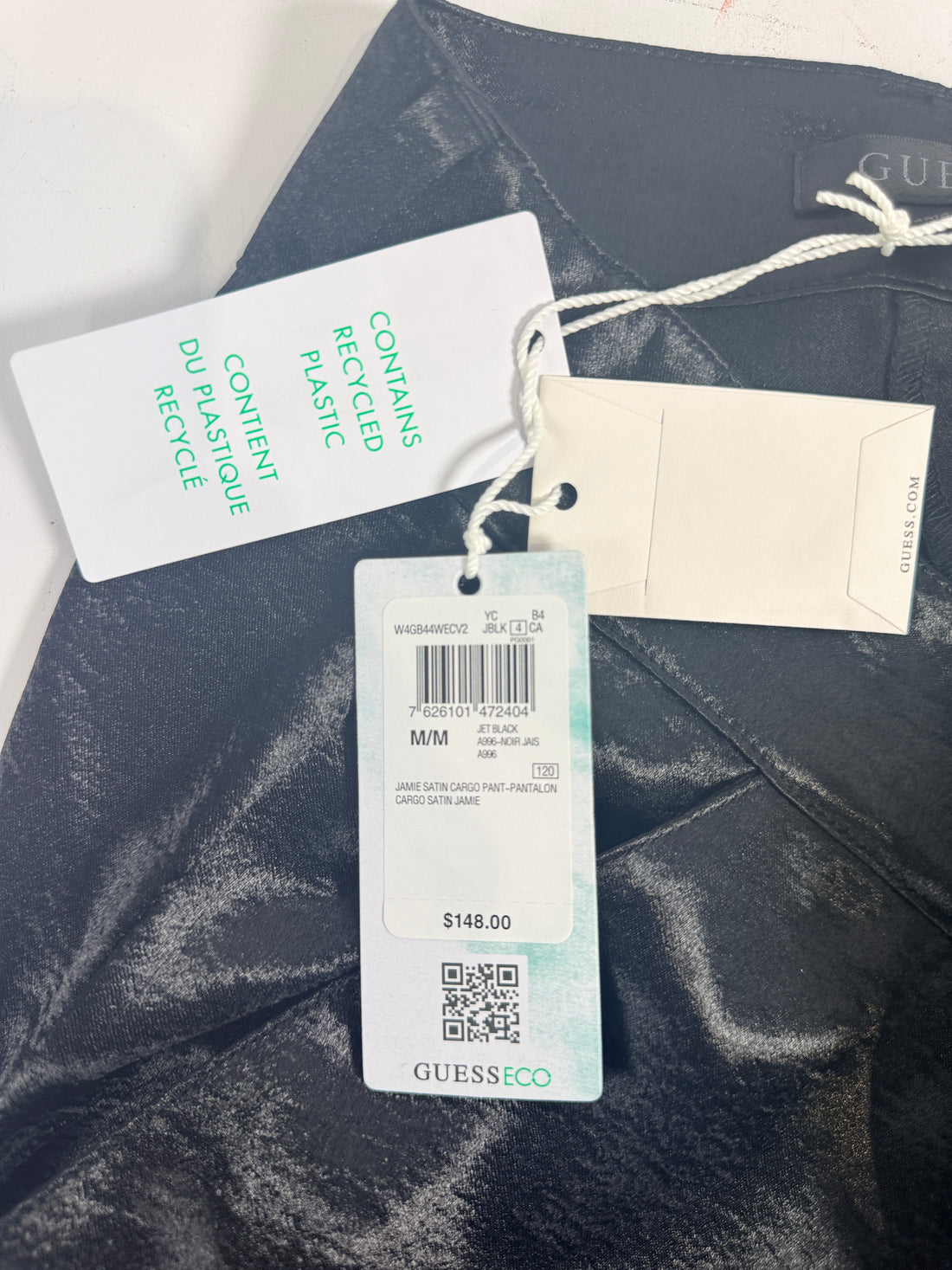 GUESS ECO Jamie Satin Cargo Pants in Jet Black, women’s medium, new with tags. Wide-leg satin cargo style with recycled materials and utility pockets.