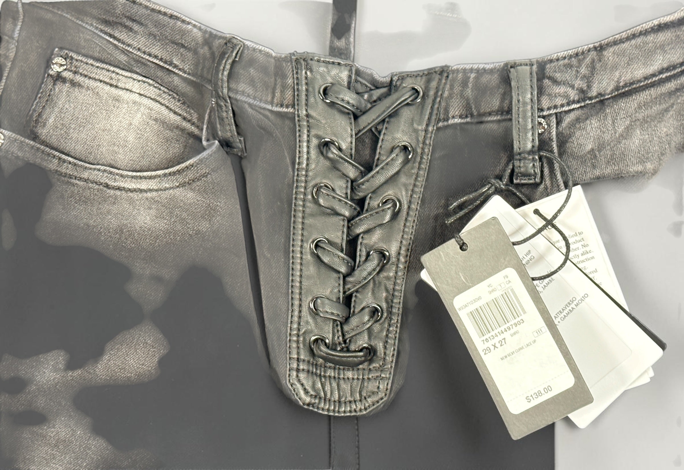 NWT GUESS Sexy Curve Skinny Mid jeans in black vintage wash featuring a lace-up front, stretch denim construction, and flattering curve fit. Size 29x27.