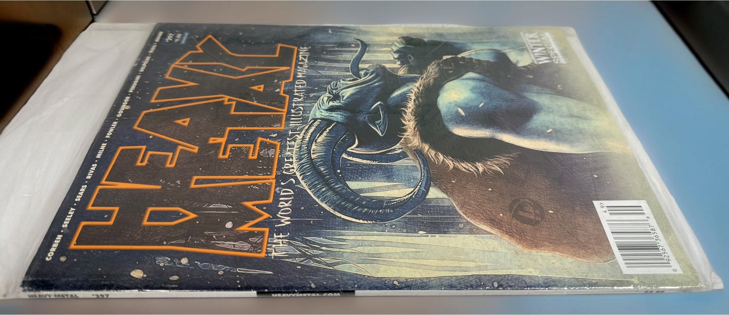 Heavy Metal Magazine #297 Winter Special 2018 sealed in original polybag with Softwood #1 insert. Richard Corben cover artwork. Collectible sci-fi magazine.