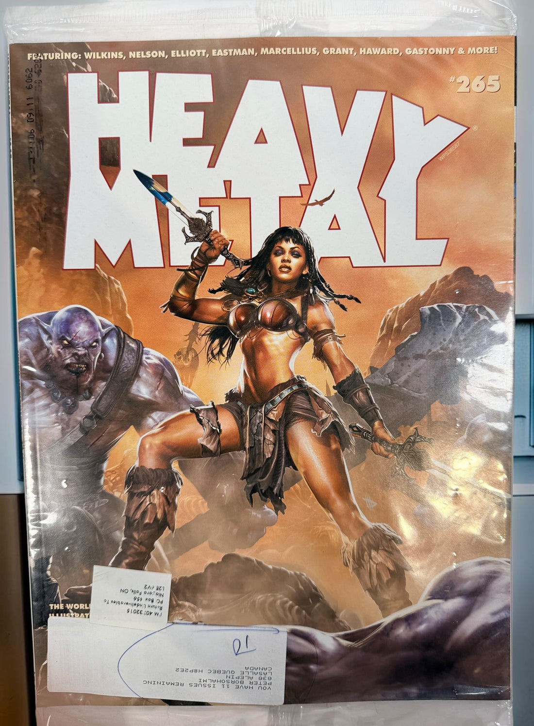 Heavy Metal Magazine #265 factory polybagged issue featuring fantasy artwork and illustrated stories. Unread collectible magazine in original publisher packaging.
