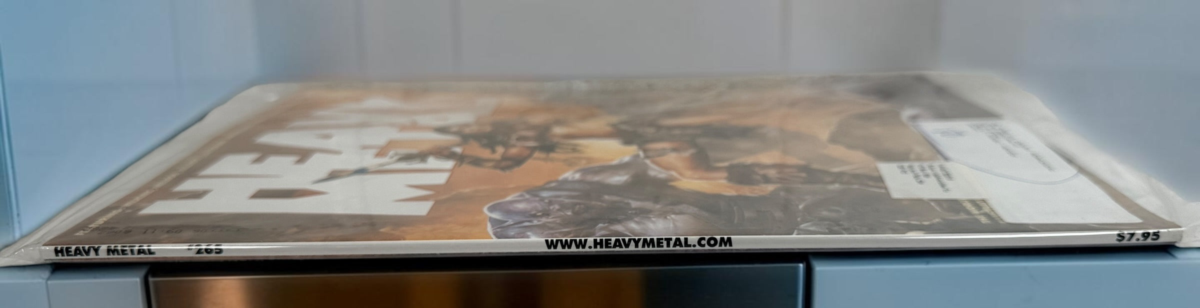 Heavy Metal Magazine #265 factory polybagged issue featuring fantasy artwork and illustrated stories. Unread collectible magazine in original publisher packaging.
