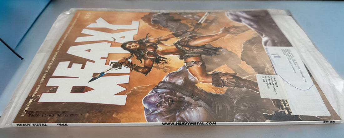 Heavy Metal Magazine #265 factory polybagged issue featuring fantasy artwork and illustrated stories. Unread collectible magazine in original publisher packaging.
