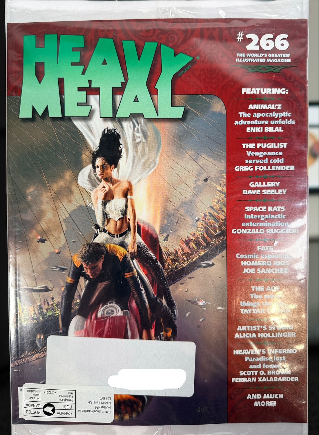 Heavy Metal Magazine #266 January 2014 featuring Dave Seeley cover art. Factory polybagged unread copy with original mailing wrapper and fantasy artwork.