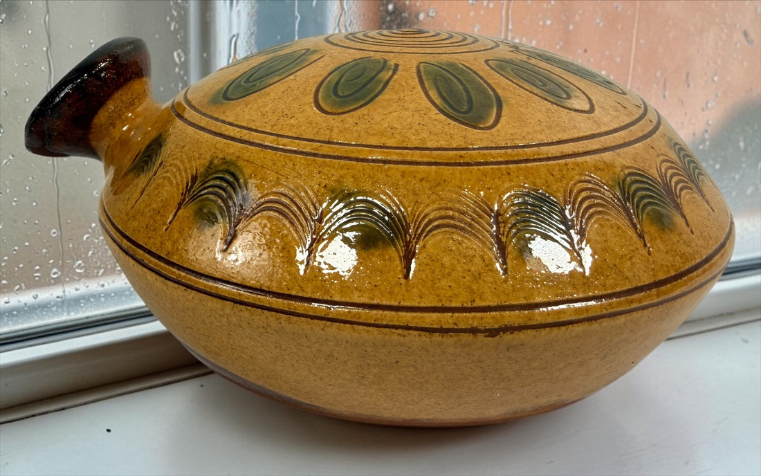Signed 1991 Troyan Bulgaria ceramic vessel with traditional folk art decoration, ochre glaze, incised motifs, and handcrafted studio pottery appeal.