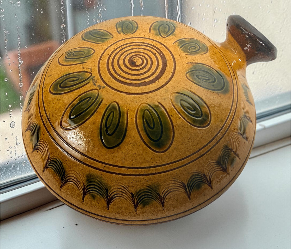 Signed 1991 Troyan Bulgaria ceramic vessel with traditional folk art decoration, ochre glaze, incised motifs, and handcrafted studio pottery appeal.