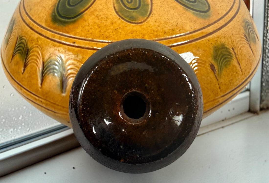 Signed 1991 Troyan Bulgaria ceramic vessel with traditional folk art decoration, ochre glaze, incised motifs, and handcrafted studio pottery appeal.