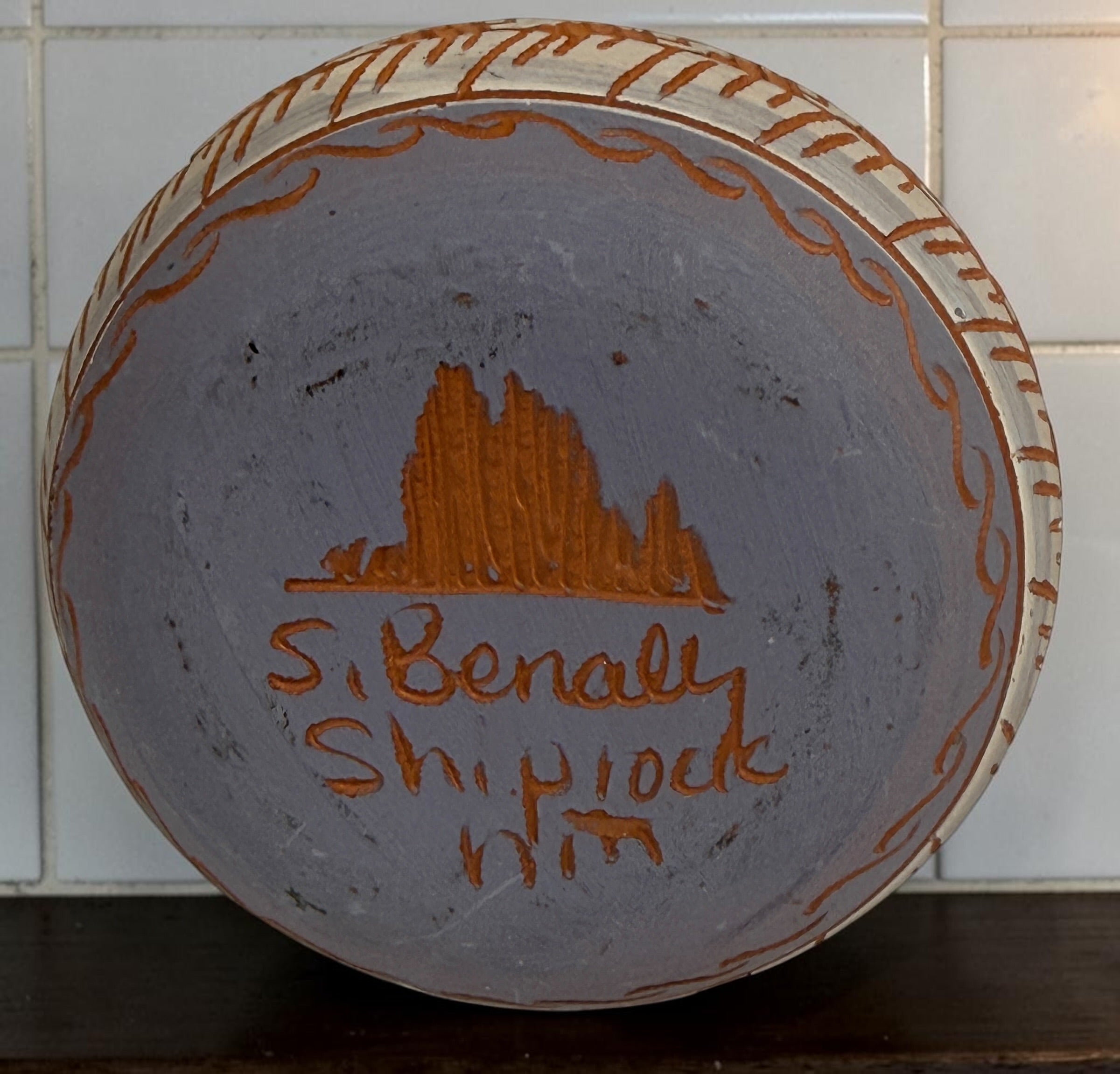 Signed S. Benaly Shiprock NM pottery vase featuring hand-carved Southwest geometric decoration. Vintage studio pottery from New Mexico.