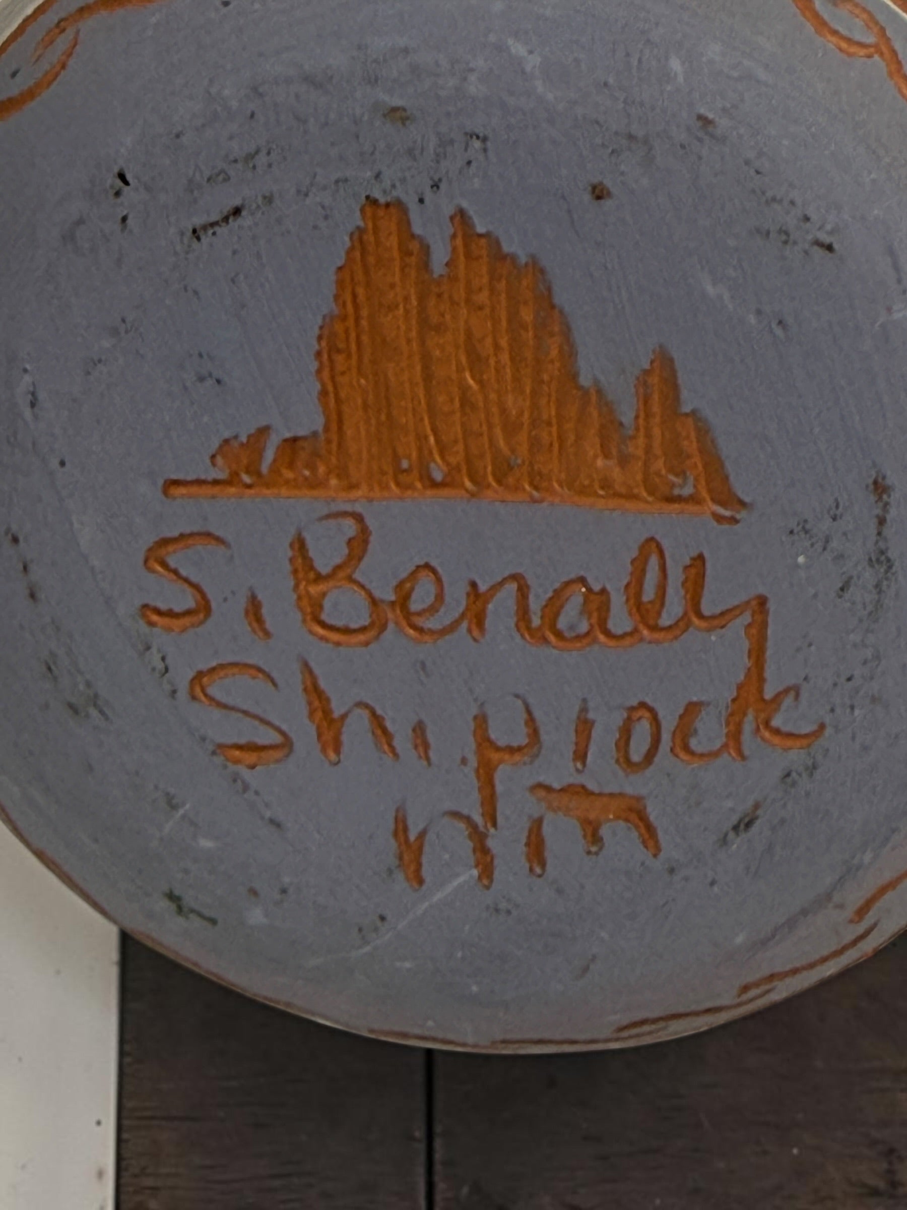 Signed S. Benaly Shiprock NM pottery vase featuring hand-carved Southwest geometric decoration. Vintage studio pottery from New Mexico.