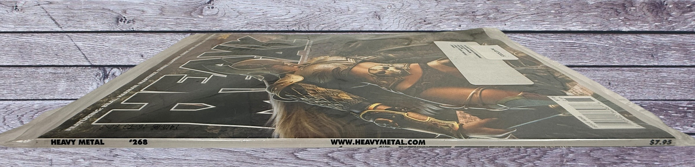 Heavy Metal Magazine #268 July 2014 featuring Richard Pace cover art. Original polybagged issue in very good condition for collectors and fans.