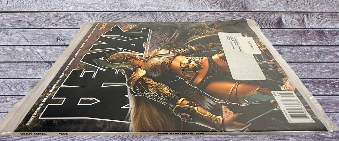 Heavy Metal Magazine #268 July 2014 featuring Richard Pace cover art. Original polybagged issue in very good condition for collectors and fans.