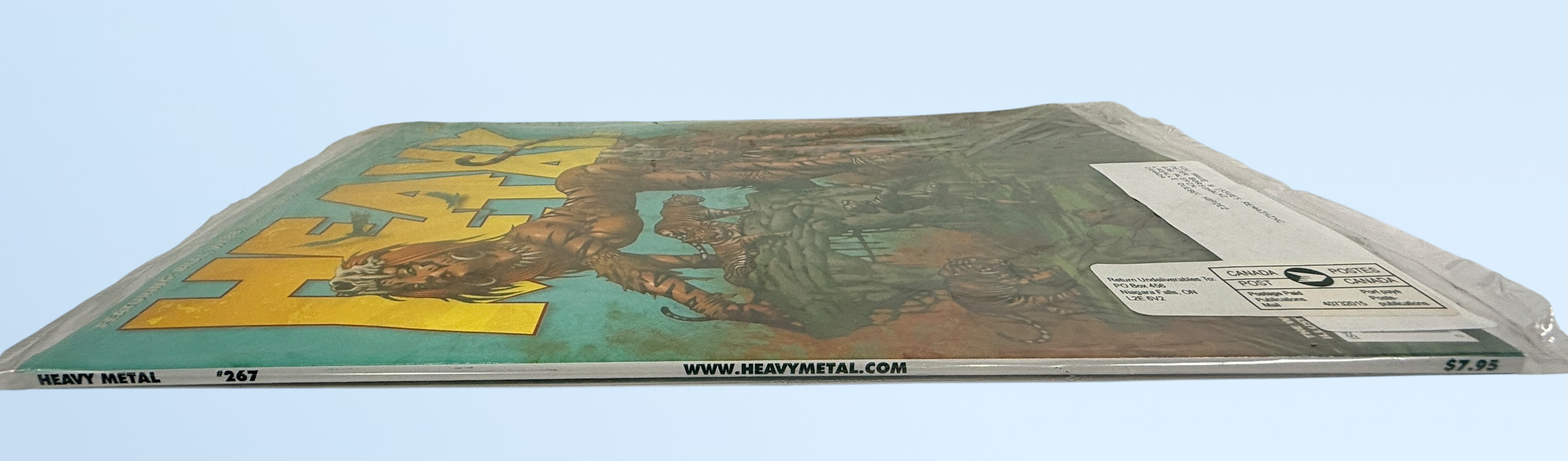 Heavy Metal Magazine #267 March 2014 factory sealed polybagged issue featuring Dave Wilkins cover art. Unread collectible with original insert included.