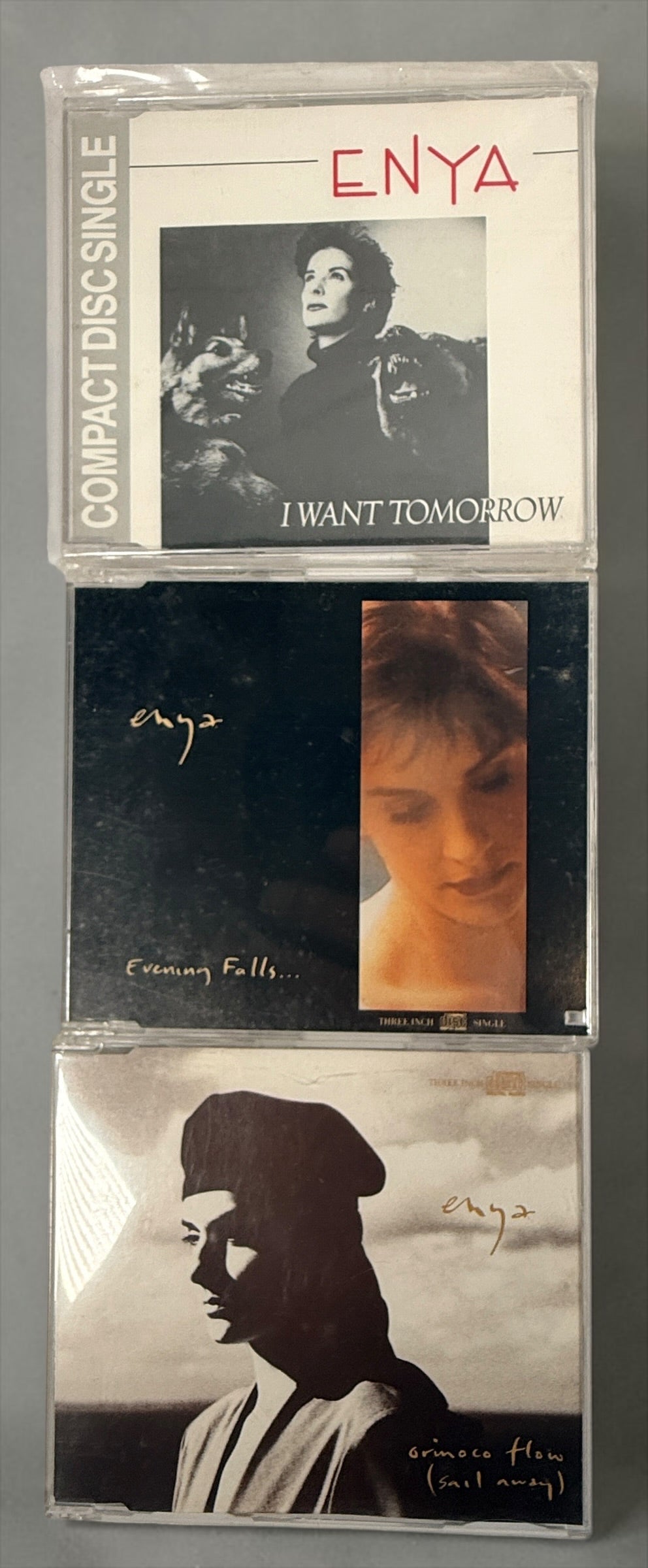 Lot of 3 original Enya CD singles including I Want Tomorrow, Evening Falls and Orinoco Flow. Late 1980s releases with original cases and inserts.