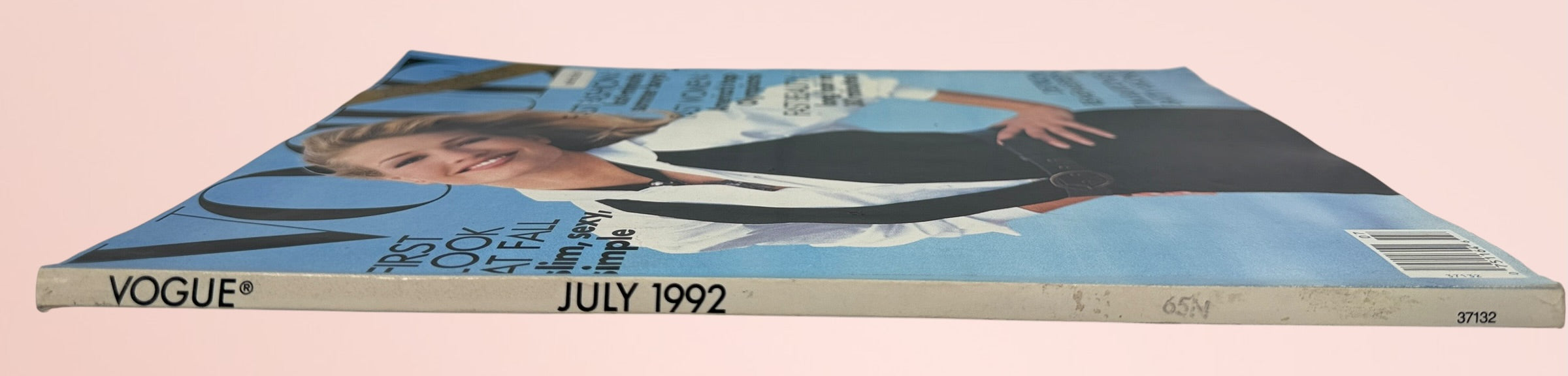 Original July 1992 Vogue magazine featuring Karen Mulder, Donna Karan fall fashion, Tim Burton, Marlene Dietrich tribute, and iconic 1990s editorials.