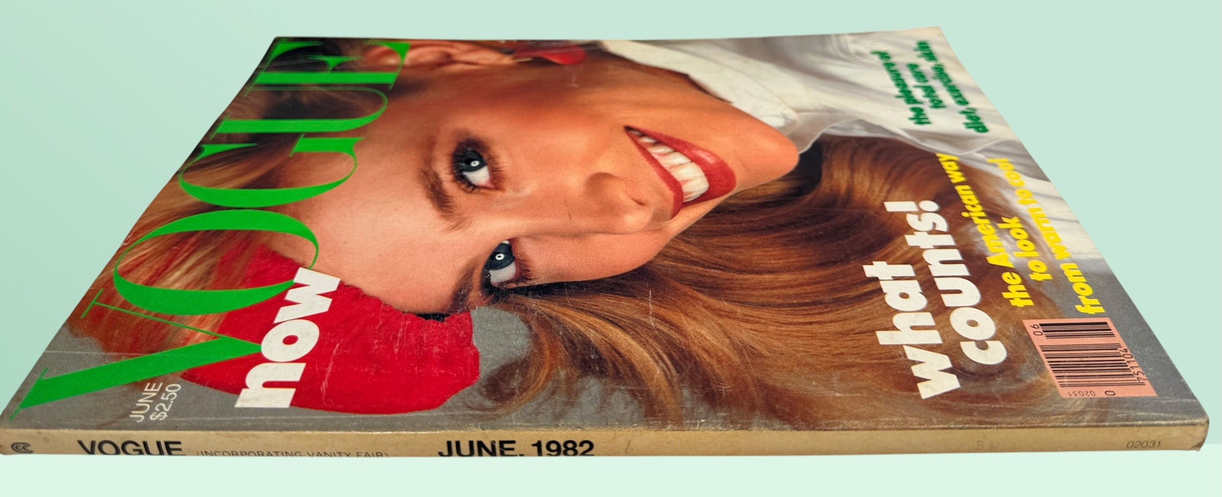 Original June 1982 Vogue magazine featuring Norma Kamali, Galanos, Brooke Astor, Lena Horne, Margaret Atwood, and iconic early-1980s fashion and advertising.