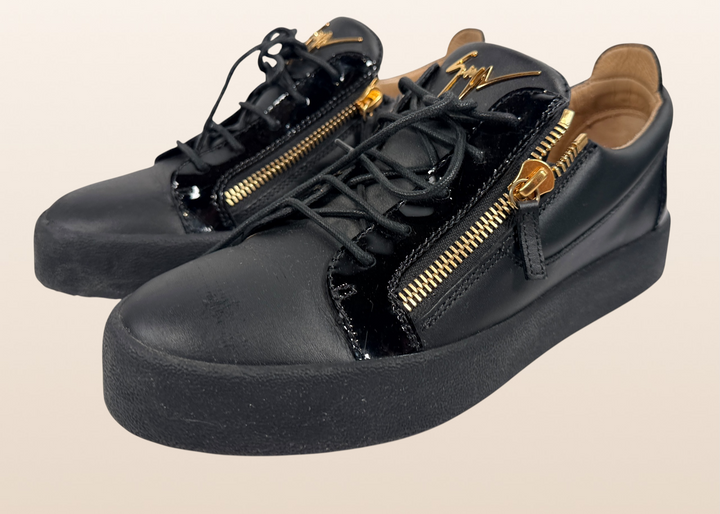 Authentic Giuseppe Zanotti black leather platform sneakers made in Italy featuring gold signature hardware, dual side zippers, leather lining, and rubber platform soles in EU 43.