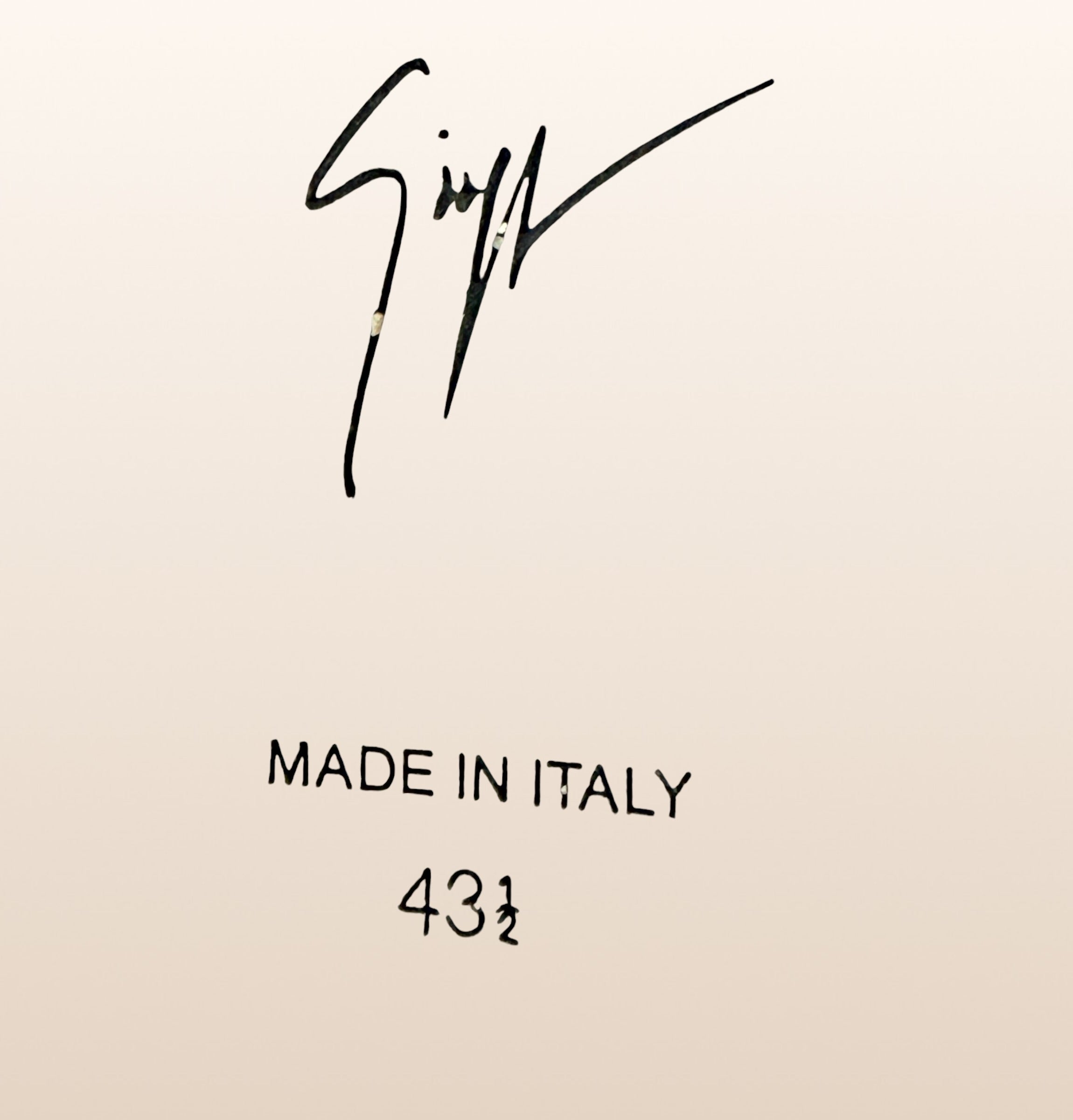 Authentic Giuseppe Zanotti black leather platform sneakers made in Italy featuring gold signature hardware, dual side zippers, leather lining, and rubber platform soles in EU 43.