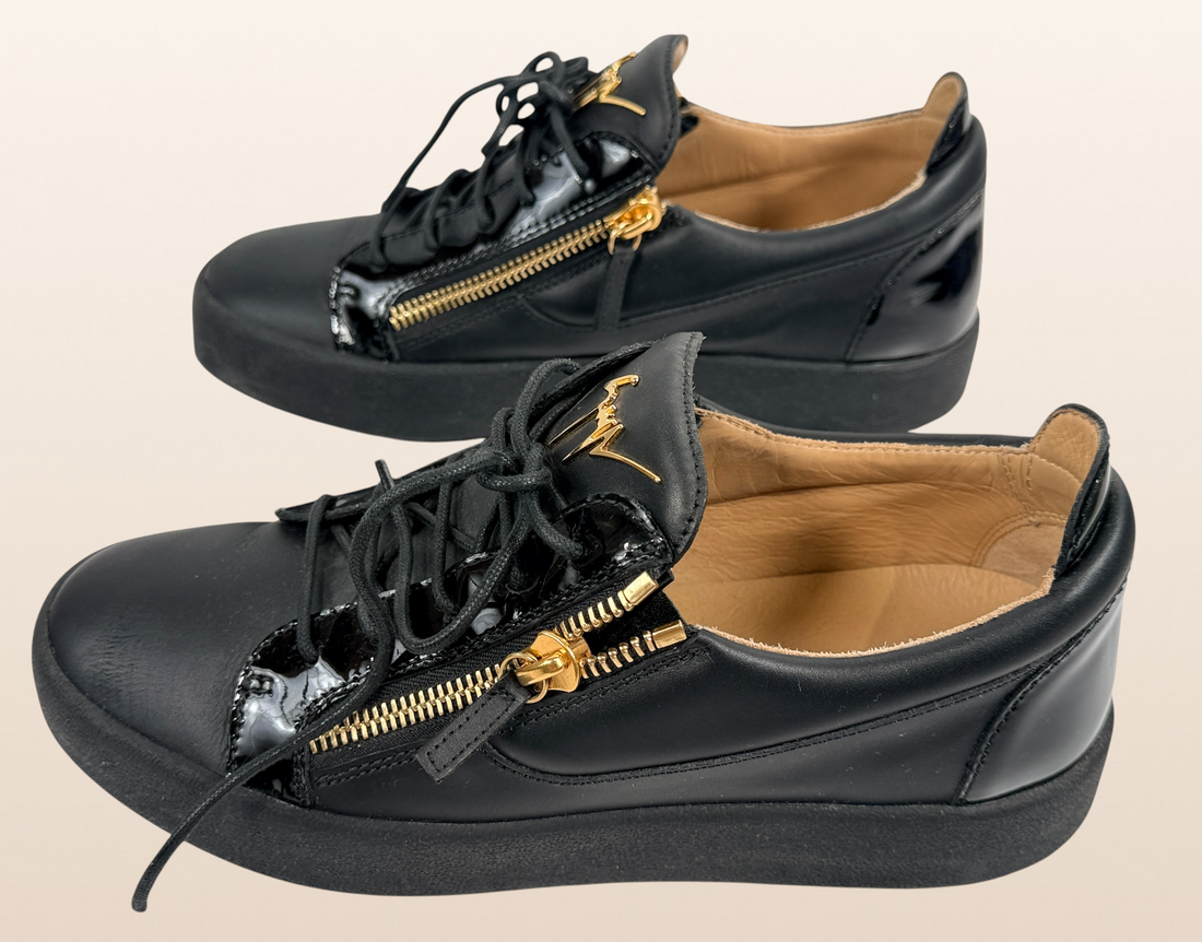 Authentic Giuseppe Zanotti black leather platform sneakers made in Italy featuring gold signature hardware, dual side zippers, leather lining, and rubber platform soles in EU 43.