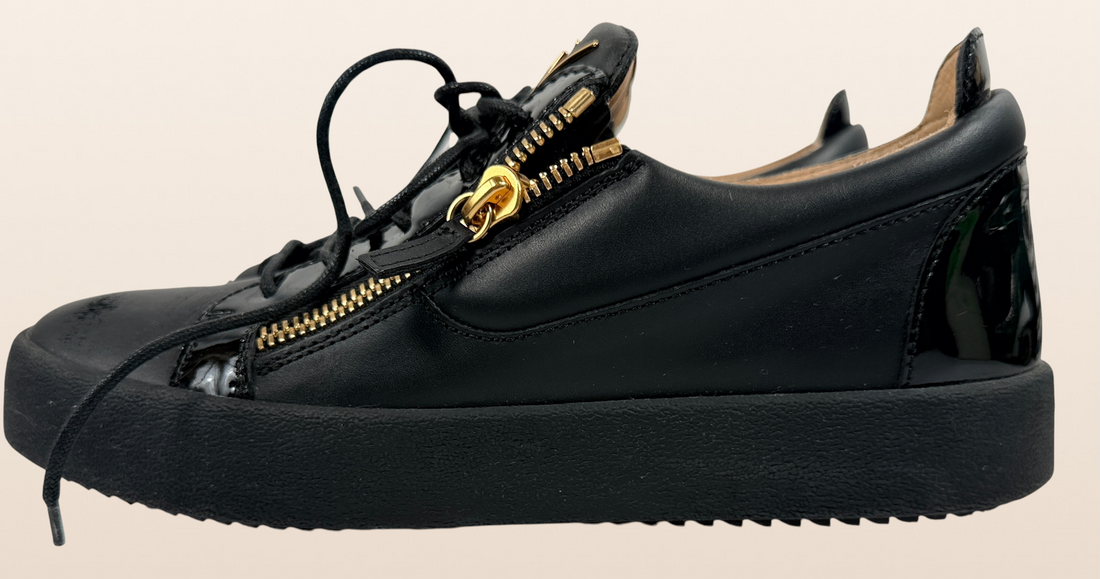 Authentic Giuseppe Zanotti black leather platform sneakers made in Italy featuring gold signature hardware, dual side zippers, leather lining, and rubber platform soles in EU 43.