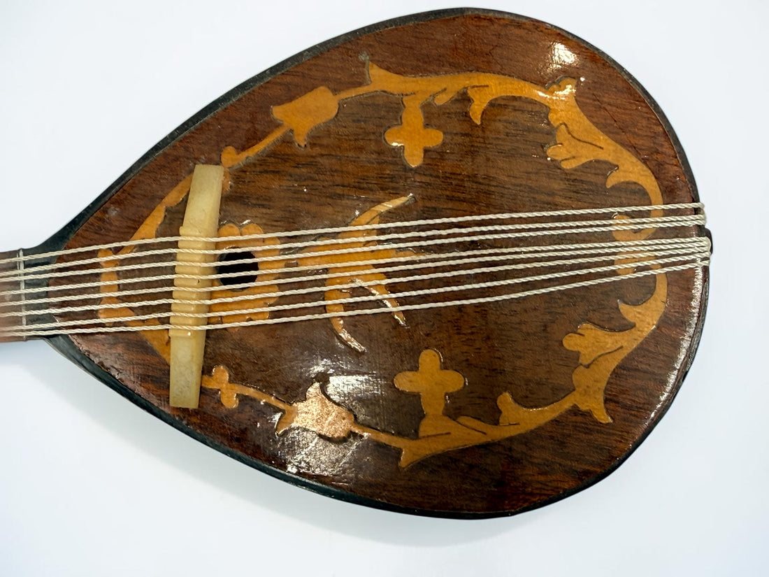 Vintage 1950s TR Made in Italy mandolin-shaped music box from the Isle of Capri featuring beautiful marquetry wood inlay and a classic wind-up musical mechanism.