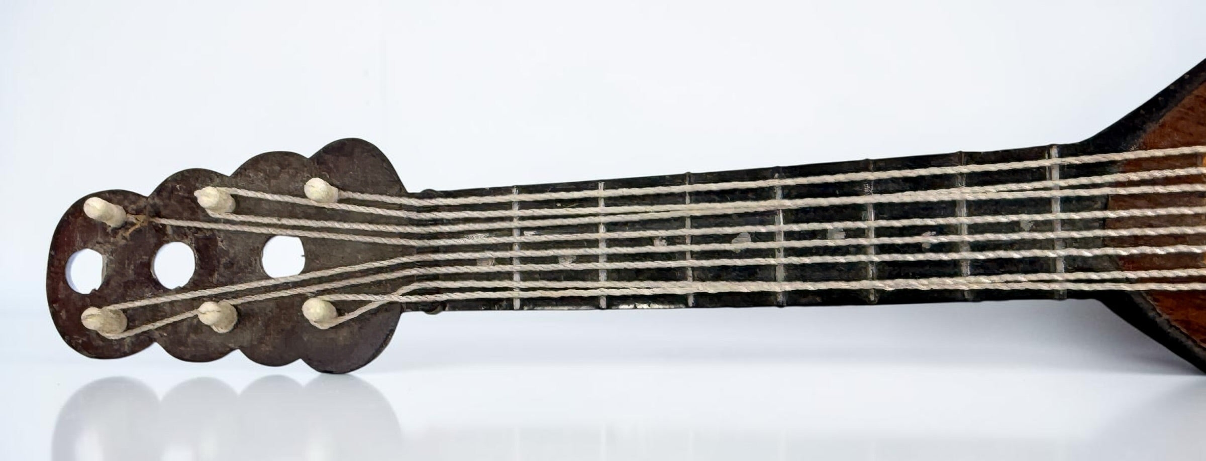 Vintage 1950s TR Made in Italy mandolin-shaped music box from the Isle of Capri featuring beautiful marquetry wood inlay and a classic wind-up musical mechanism.