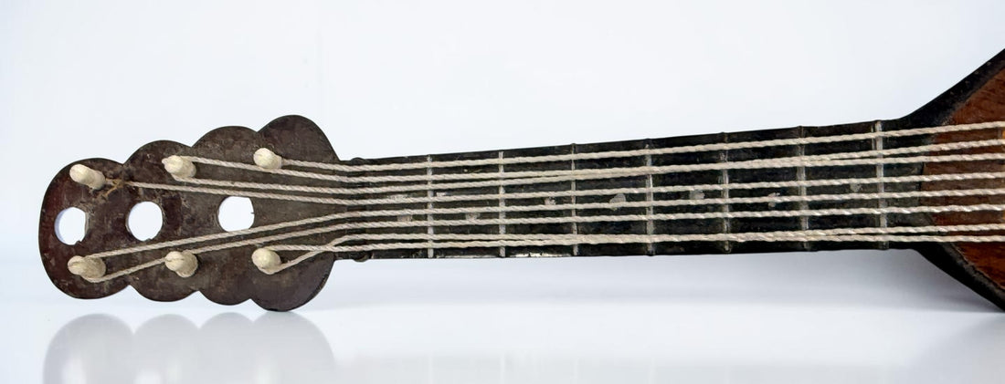 Vintage 1950s TR Made in Italy mandolin-shaped music box from the Isle of Capri featuring beautiful marquetry wood inlay and a classic wind-up musical mechanism.