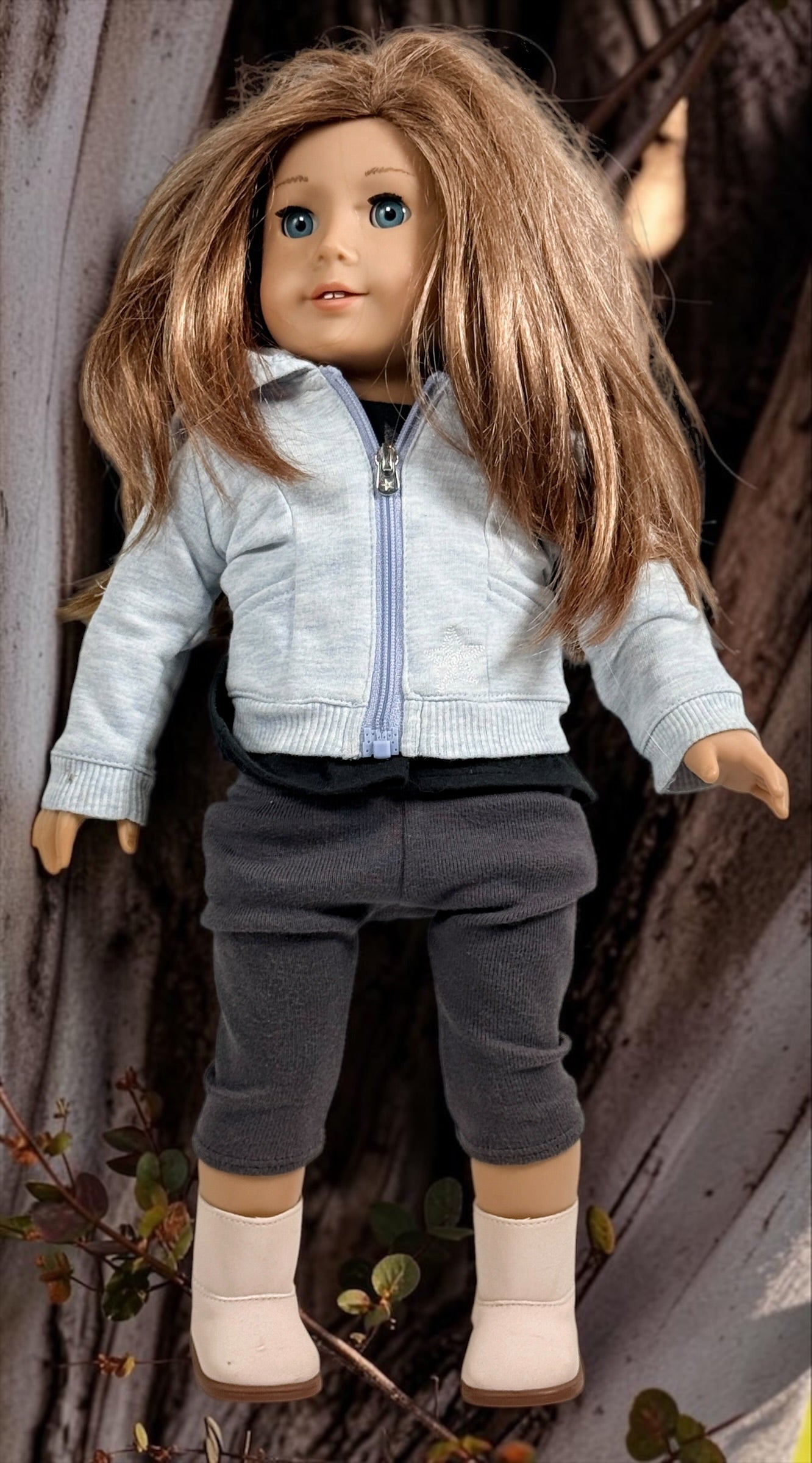 Authentic American Girl 18-inch Truly Me doll with blue eyes, light brown hair, gray hoodie outfit and pink boots. Good pre-owned condition, complete outfit included.